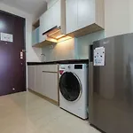 Simply Furnished Studio At Menteng Park Apartment By Travelio